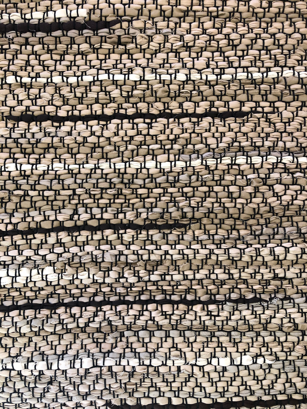 Brown rag rug with diamond weave