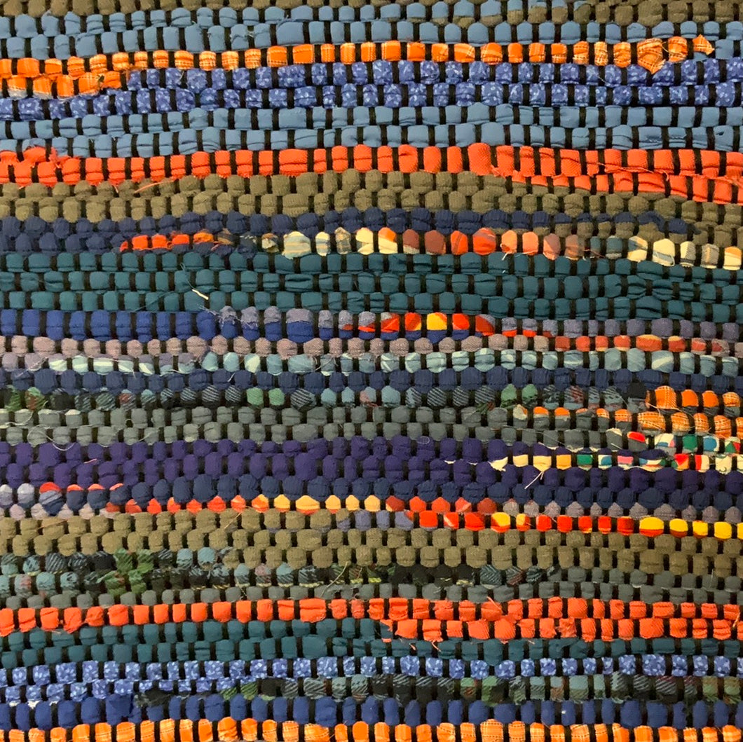 Multiple shades of blue with orange, 24” x 42”