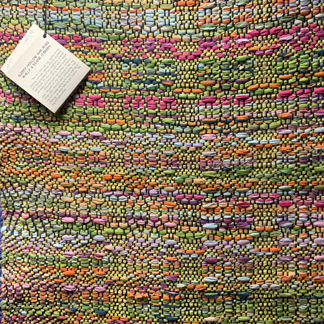 Multicolored 26” x 38” rag rug