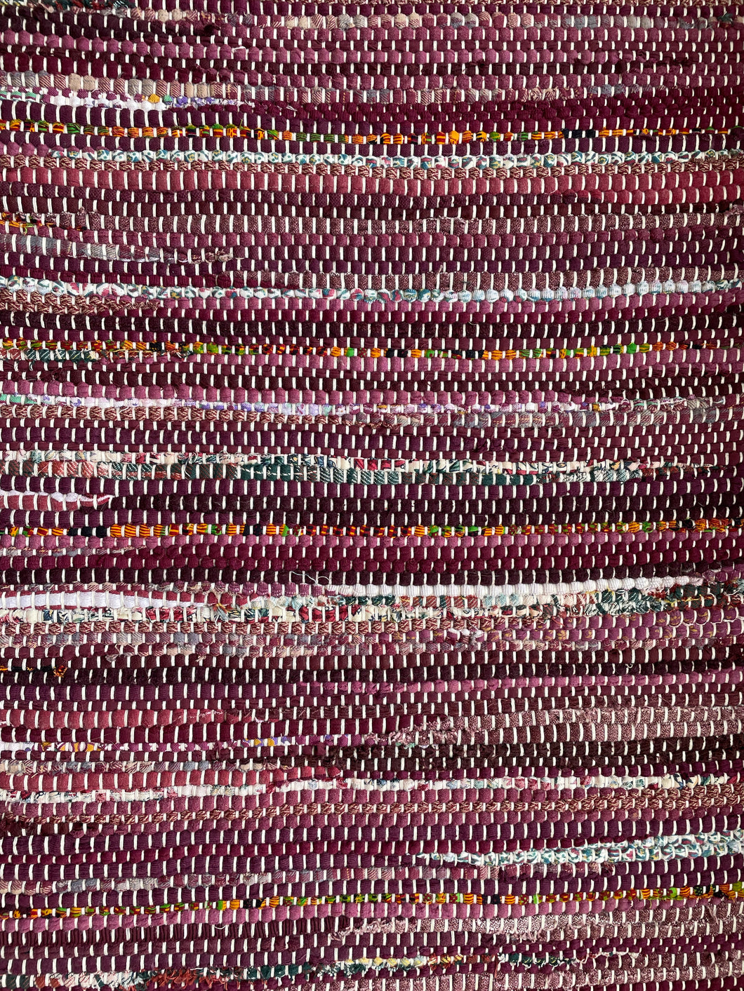 Maroon 29” x 39” rag rug