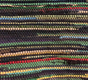 Navy and green rug, 34” x 54”