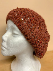 Tan hand-knit hat