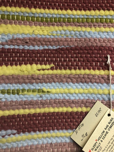 Yellow and pastel pink 24” x 38” wool rag rug