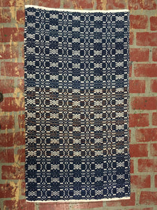 Blue and white wool rug 29” x 51”