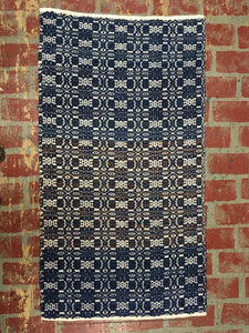 Blue and white wool rug 29” x 51”