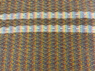 Brown wool diamond pattern with white wool stripes on rainbow warp: 26” x 43”