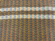 Brown wool diamond pattern with white wool stripes on rainbow warp: 26” x 43”