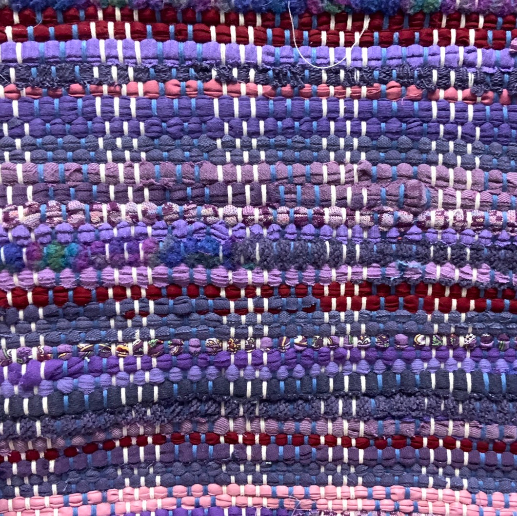 All shades of purple with cranberry highlights  24” x 39”