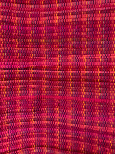 Pink rag rug on rainbow warp: 28” x 44”