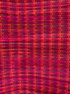 Pink rag rug on rainbow warp: 28” x 44”