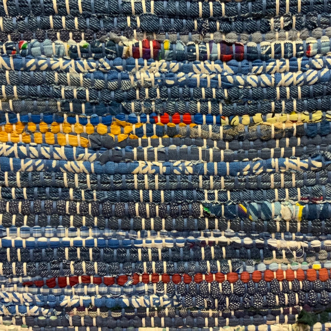 Blues, denims with red, yellow and white highlights. 24” X 39”