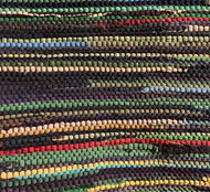 Navy and green rug, 34” x 54”