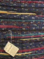 Navy blue with stripes of yellow and red 30” x 48” rug