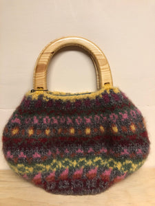 Hand bag, lined and zips closed