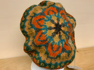 Brown, orange, and green tam hat
