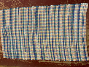 White and blue on rainbow warp rag rug: 27” x 44”
