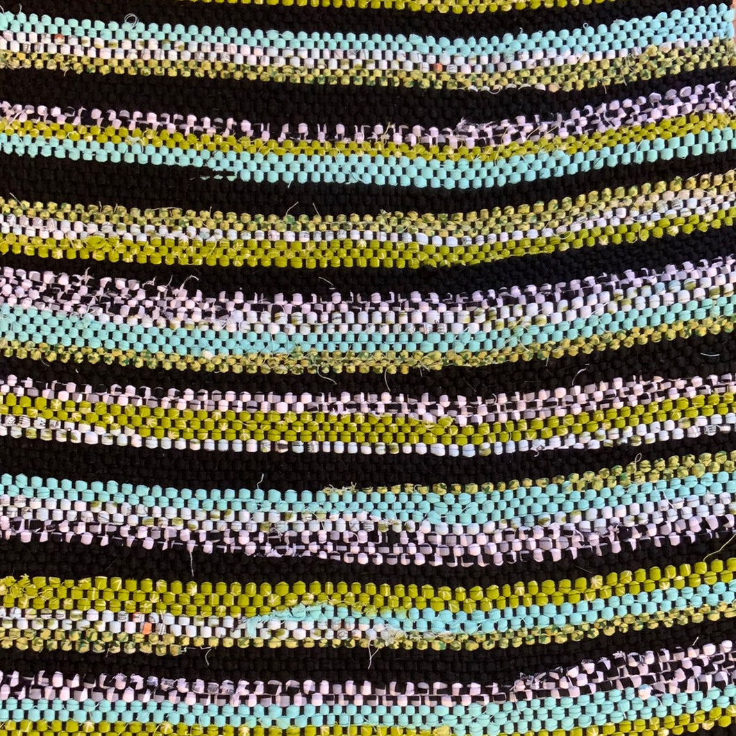 Runner with black stripes