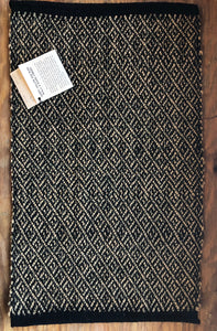 Brown/beige and streaks of green, with diamond weave pattern 17.5” x 27.5”