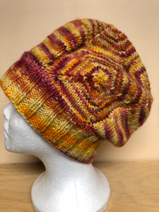 Yellow, orange and red wool hat